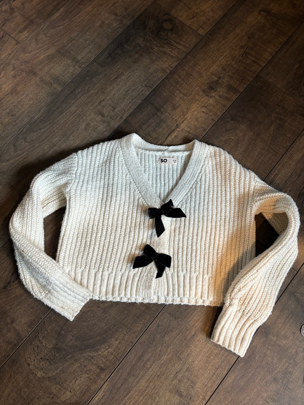 SO Cream Cropped V-Neck Sweater with Black Bow Details